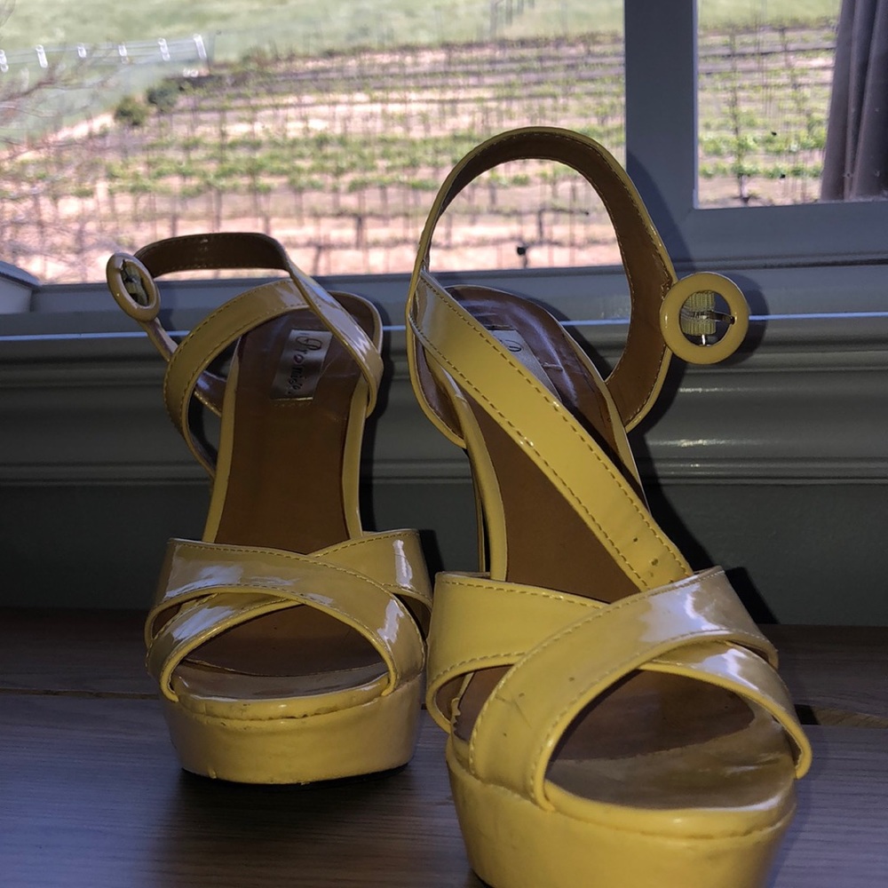 Yellow high heels from promise, size 7